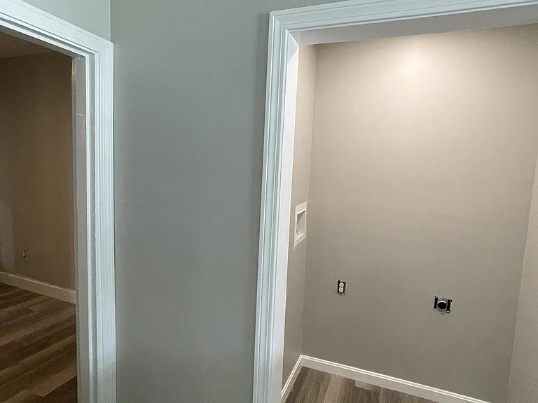 Laundry room and other interior bedroom / office