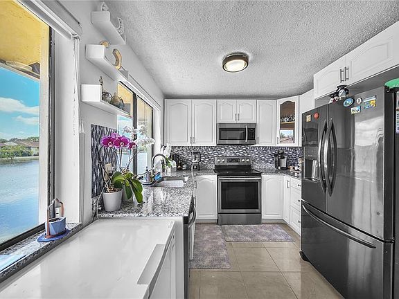 4th image of 410 NW 214th Street #205