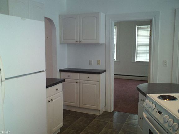 Kitchen- view from sink area toward a bedroom