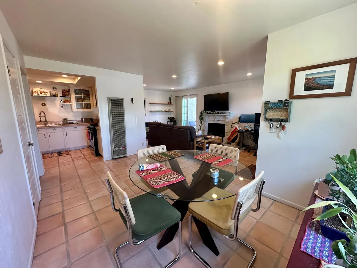 Dining room into kitchen view. - 6913 Quail Pl #A