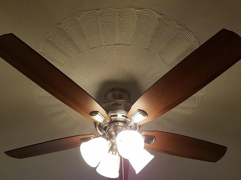 Dining room ceiling Fan ("Hunter") fixtures recently replaced New with custom ceiling desings.