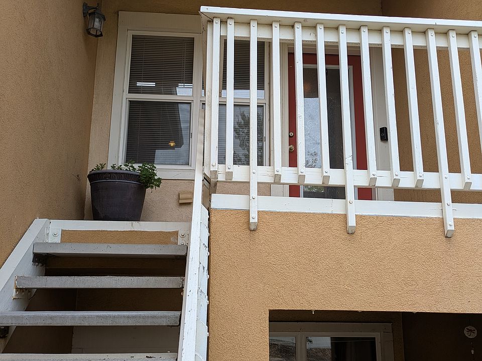 Stairs leading up to front door