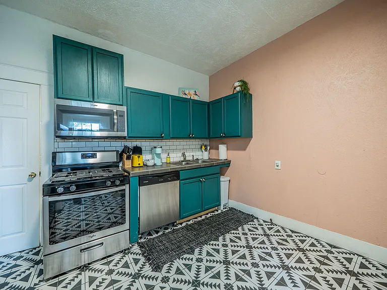 Cook in style with vibrant decor and high-end stainless appliances.