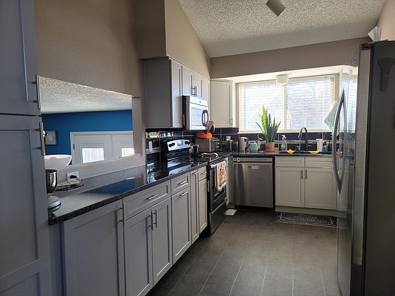Recently updated kitchen with custom cabinets!