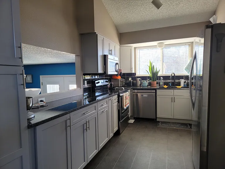 Recently updated kitchen with custom cabinets!