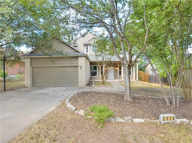 Front of home. Upgraded stone exterior.