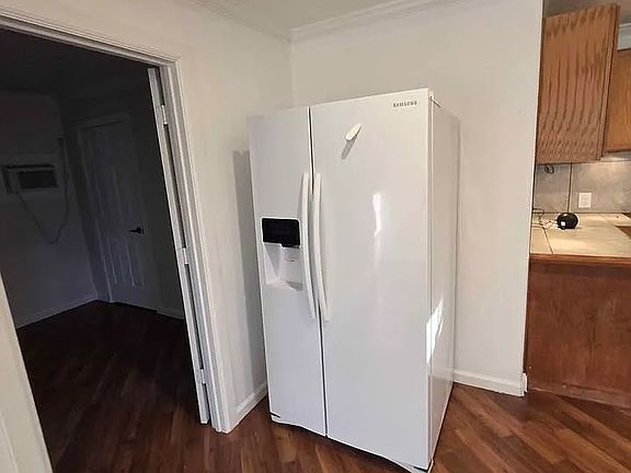 Refrigerator with doorway to master
