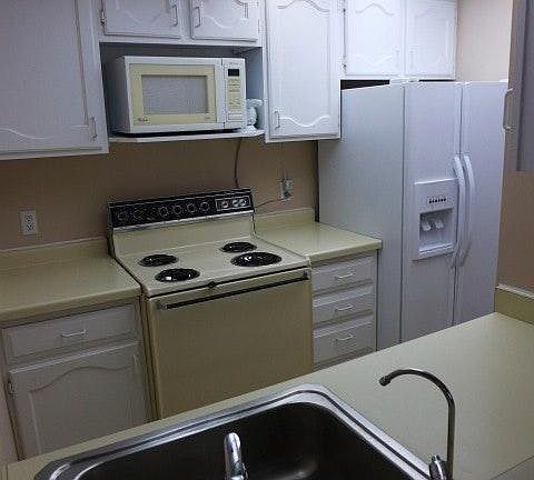 kitchen with pass-through to dining
