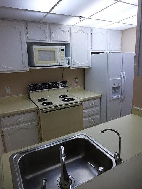 kitchen with pass-through to dining