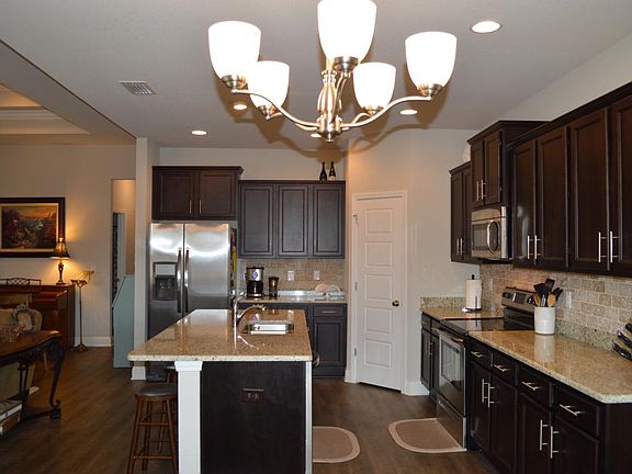 Ample counter space and a walk in pantry.