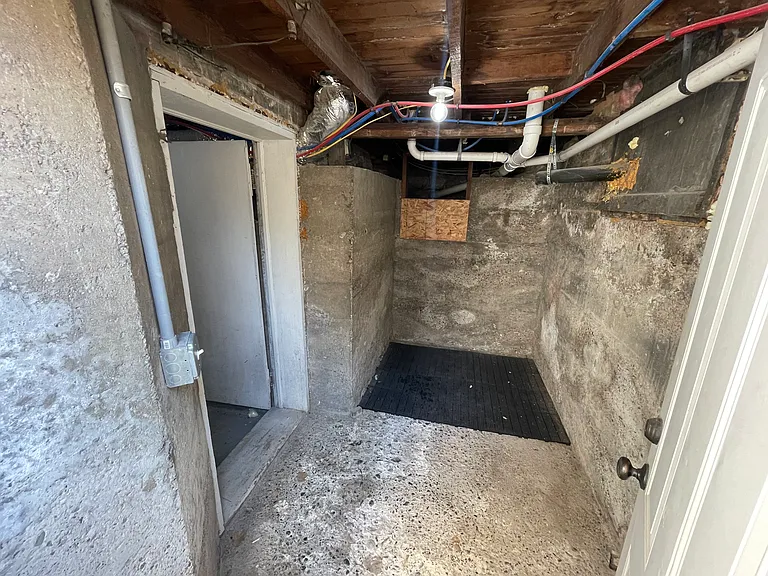 Entrance for basement storage space