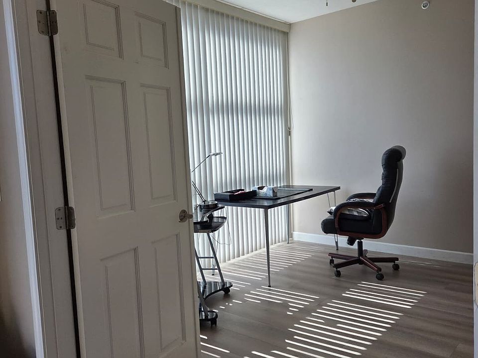 SPACIOUS DEN WITH HARDWOOD FLOORING!