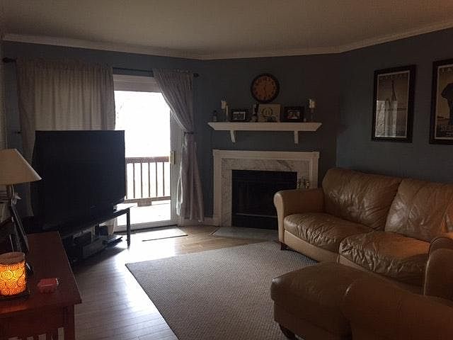 Main level family room to wood balcony