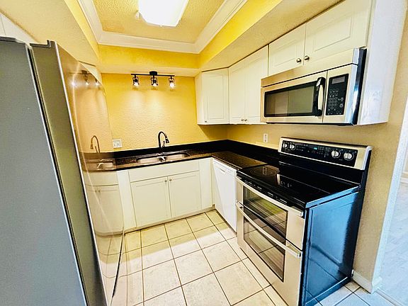 5th image of 6647 La Mirada Dr W Unit 8