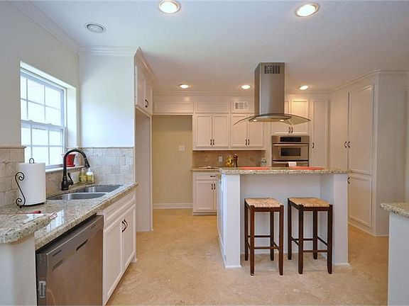 Cooks kitchen with stainless steel appliances and granite counters. Thoughtful planning went into this beautiful kitchen.