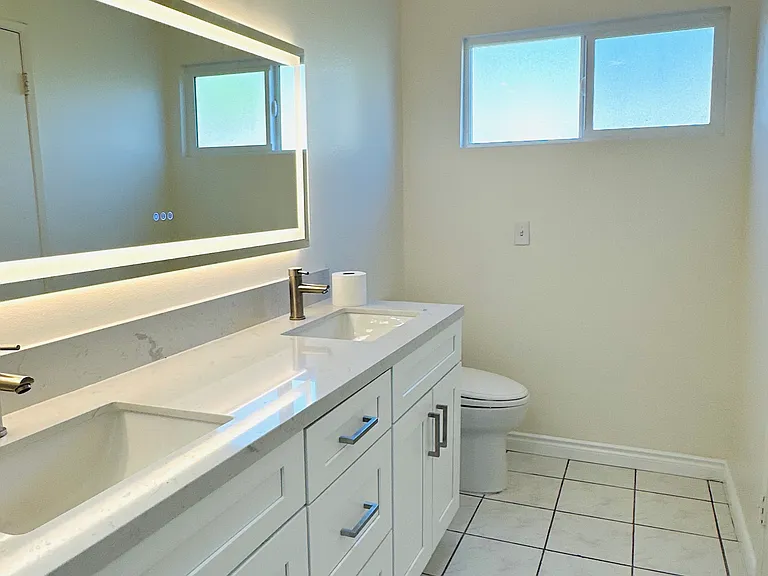 First floor full bathroom - Renovated with double sink vanity, extra storage, led mirrors and new shower