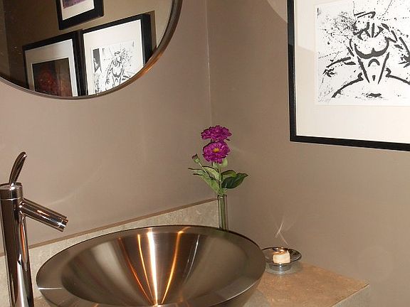 Fantastic half bath with a very zen feeling.
