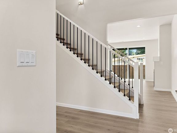 This is a representation only using the same floorplan in the community, but on a diffrerent lot. Co