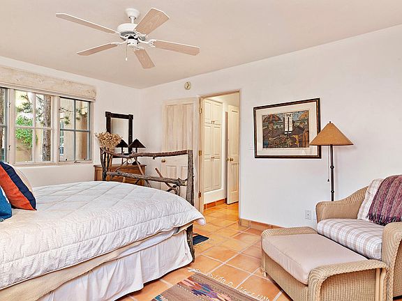 Bedroom 2 with a queen bed and ceiling fan