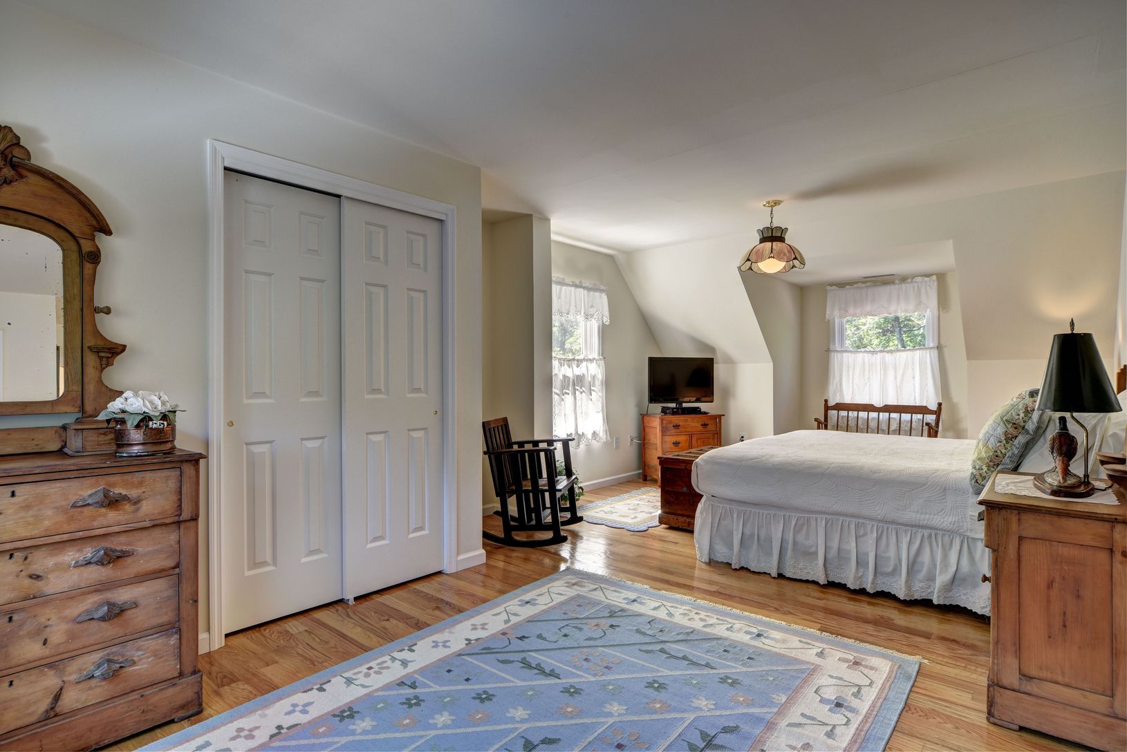  Master suite with king bed, flat screen tv, and private bathroom