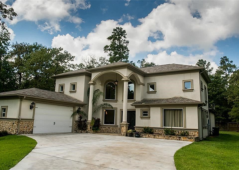 Gorgeous custom built home on over an acre, beautiful touches and details throughout the home. 12002 Forest View Trail, Conroe, TX 77385.
