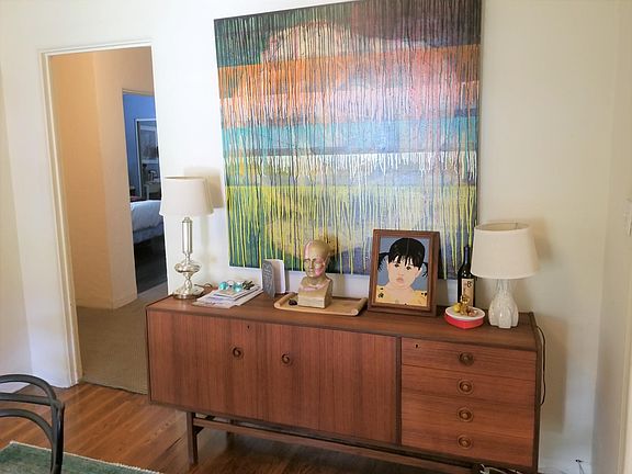 Diningroom buffet table with open hallway leading to bedrooms