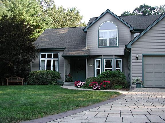 Stree t-Bond stamped and painted driveway adds curb appeal....