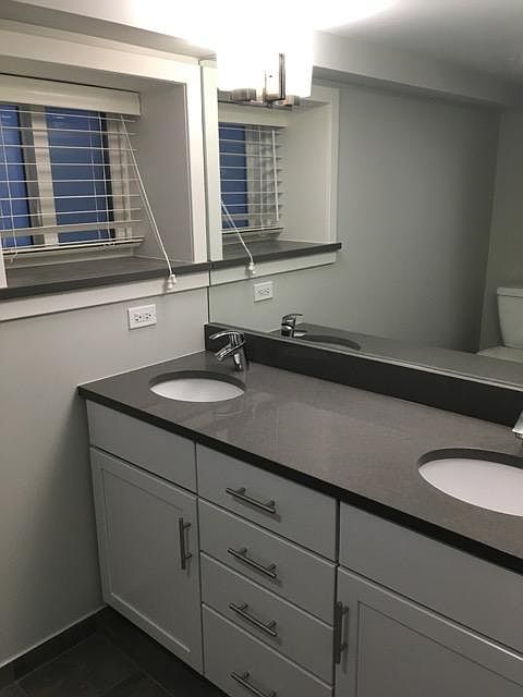 Bathroom features two sinks