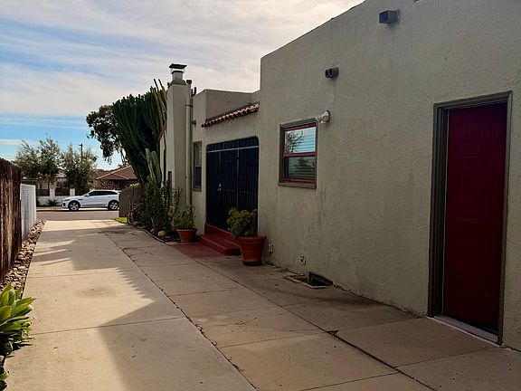 Your driveway that easily fits two cars with two points of entry into your home.
