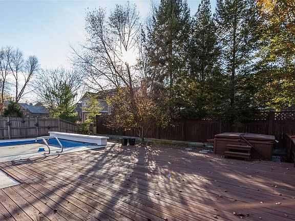 Rear deck and patio with below ground heated swimming pool, automatic cover, portable spa/hot tub. Great times to be had enjoying this great entertainment area.