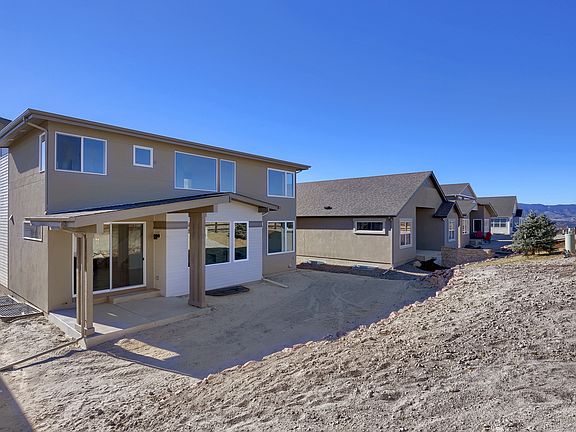 Optional Covered Patio Photo representing home to be built and may demonstrate optional features