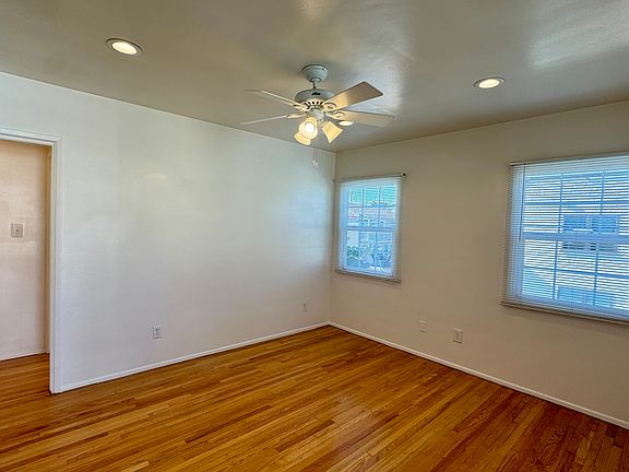 Photo depicts the living room and entrance to the bedroom and bath area as soon as you walk in the door.