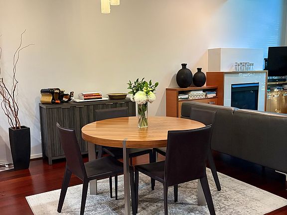 Contiguous dining area connecting the kitchen and the living area