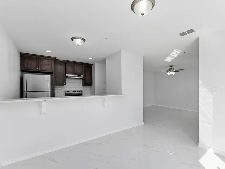 Downstairs no balcony view of kitchen, dining area and living area