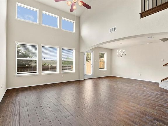 Low Maintenance Wood Tile Flooring in Main Living area and Dining area Lots of Windows for Natural Light