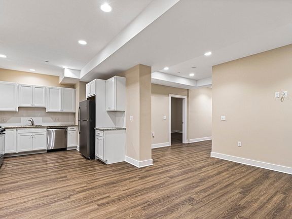 View of Kitchen + dining/living area.