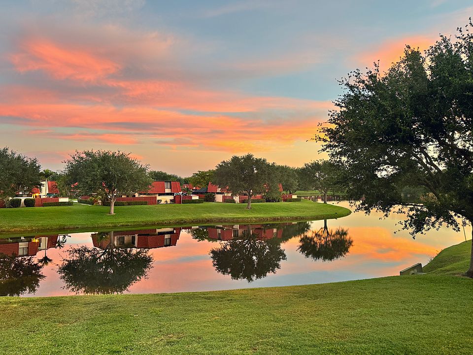 Enjoy stunning sunrise lake views from the master bedroom. (Photo taken April 2024)