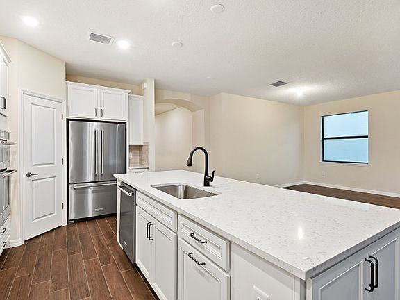 Kitchen Open to Gathering Room