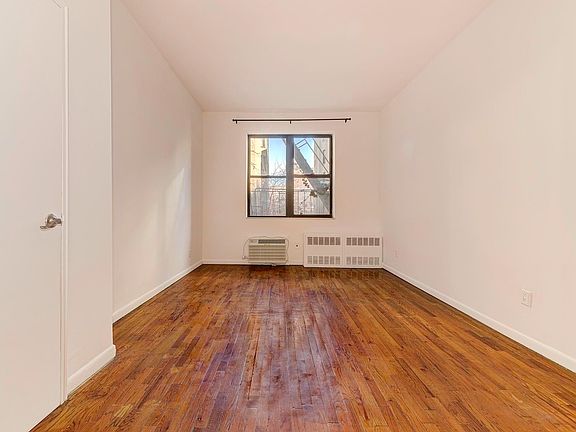5th image of 225 E 10th St APT 3C