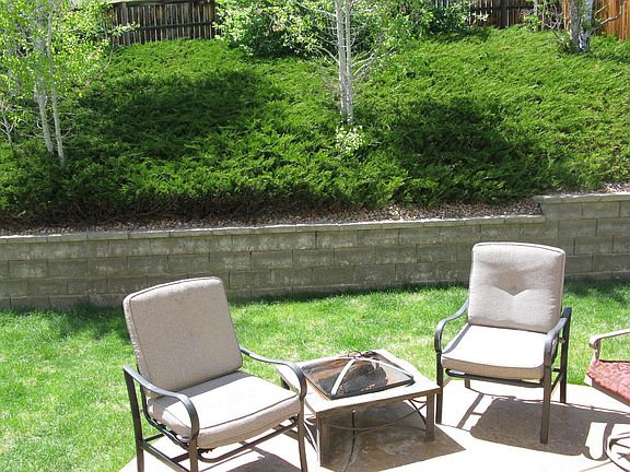 Concrete patio / sitting area in the back yard.