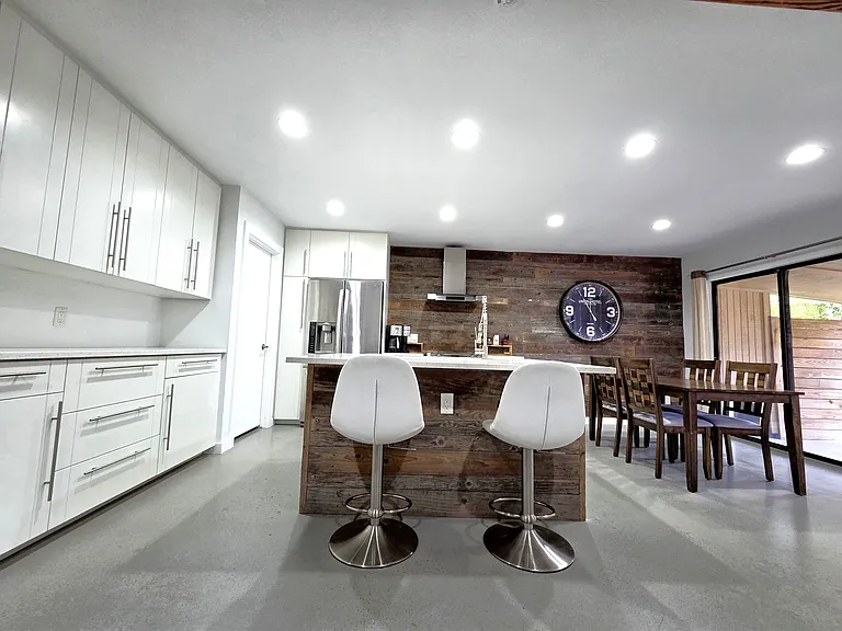 Large Kitchen Island seating with designer soft close cabinets and drawers