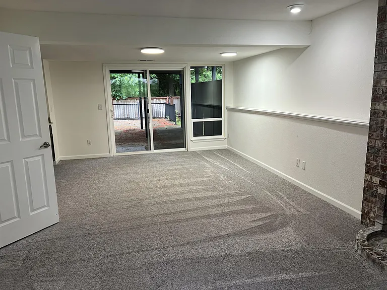 Downstairs Family Room with Access to Back Deck / Yard