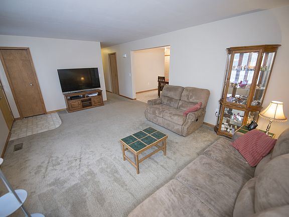 Another view highlights the entry and coat closet.