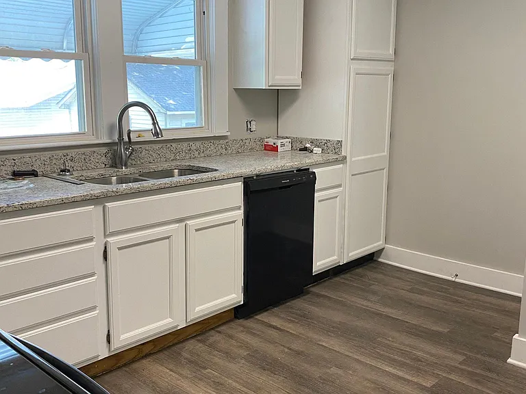 Granite, new appliances, dishwasher, dispose-all, microwave, easy care floor, side by side stainless fridge, spacious cabinets, lazy Susan storage, new fixtures, stainless sink, tons of storage/cabinet space.