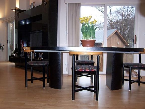 Eat-in kitchen looks out to patio