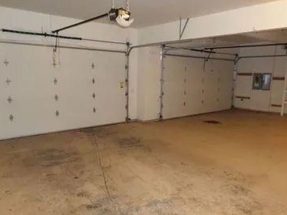 4 car garage with shop vac.