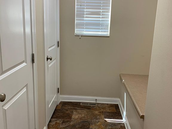Drop zone off garage, coat and pantry closets