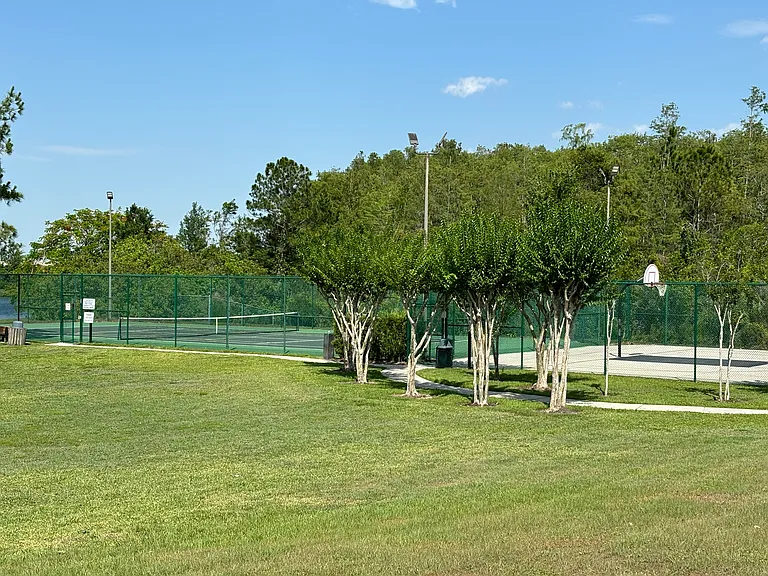 Community tennis and basketball courts