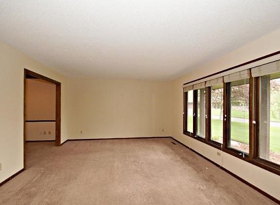 Huge living room with new windows and fresh paint!
