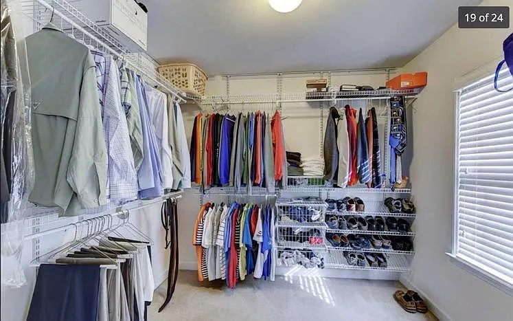 Primary bedroom closet.